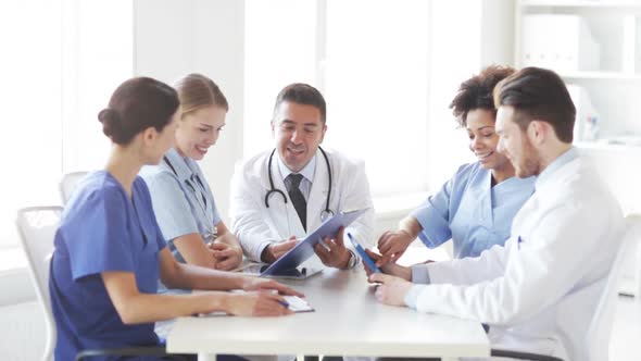 Group Of Happy Doctors Meeting At Hospital Office 3 alt