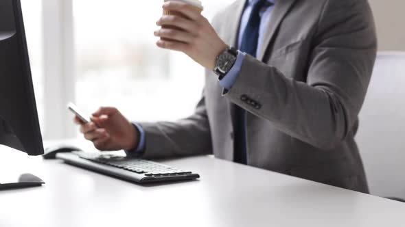 Close Up Of Businessman With Smartphone And Coffee 3