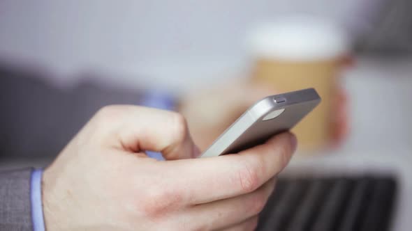 Close Up Of Businessman With Smartphone And Coffee 4 alt