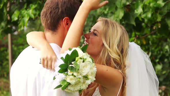 Newly Married Couple Kissing On Tropical Beach At Sunset 5