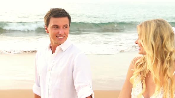 Newly Married Couple On Tropical Beach At Sunset 5 alt