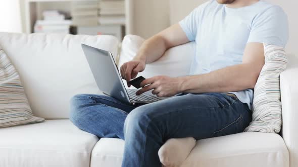 Close Up Of Man With Laptop And Credit Card 2