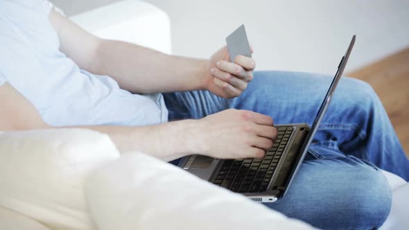 Close Up Of Man With Laptop And Credit Card 4