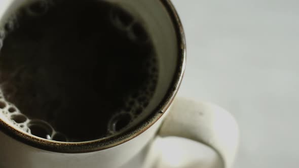 Extreme Closeup Of Pourring Hot Water For Instant Coffee