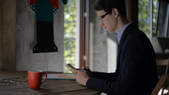 Young Man Texting Message