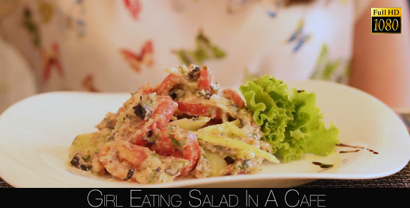 Girl Eating Salad In A Cafe 8 alt