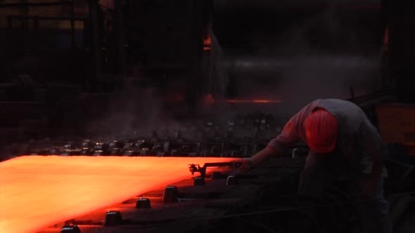 Rolled Sheets of Metal Red Hot Metal Worker
