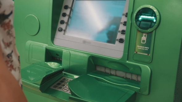 Woman Using Atm
