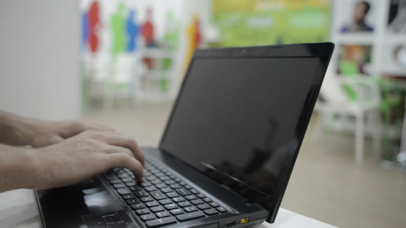 Typing on Laptop alt