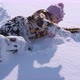 Child Play in Fluffy Snow - VideoHive Item for Sale