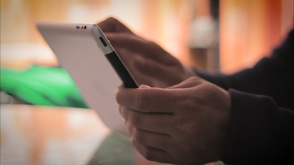 Man Hand Using Tablet