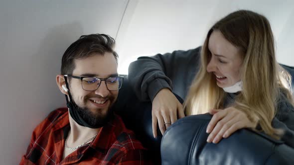 Friends on Airplane Board Travelling Together After Pandemic Time