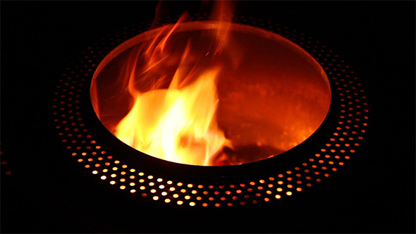 Burning Fire Barrel at Night