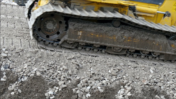Yellow Bulldozer with Big Tires on a Construction alt