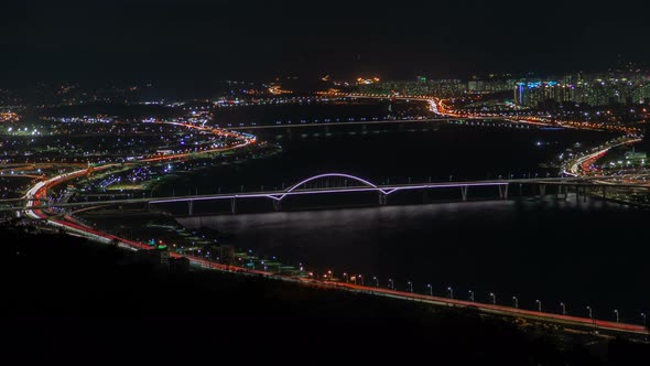 Timelapse Seoul River Winds Between Illuminated Districts