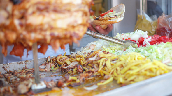 Adult Man Preparing a Kebab