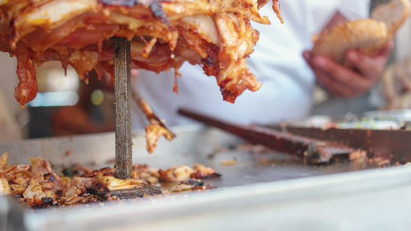 Adult Man Preparing a Kebab