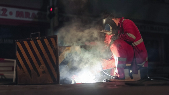 European Caucasian man Fixing the Rails