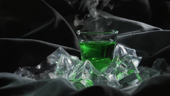 Green Cocktail with Smoking Dry Ice