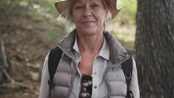 Active senior woman in the forest