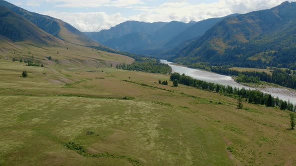 Blue Katun river in the middle of mountains of Ak-Kem valley in Altai