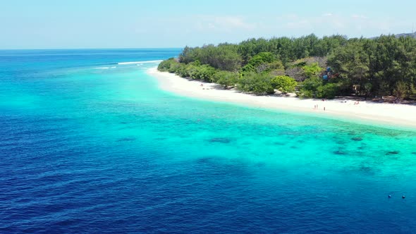 Tropical drone copy space shot of a paradise sunny white sand beach and aqua blue water background