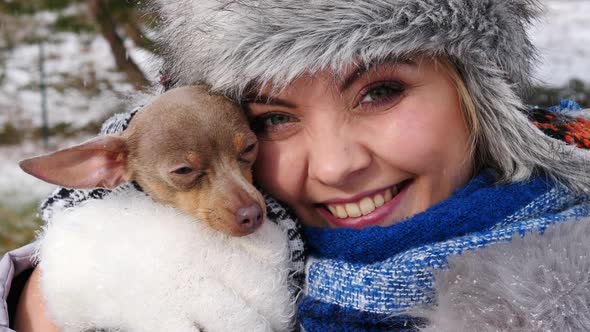 Girl Hug with Love her Dog. Winter