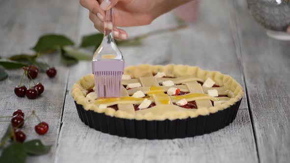 Ingredients for baking cake stuffed with fresh cherry pie