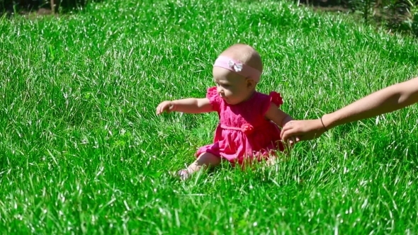 Baby Girl On a Grass