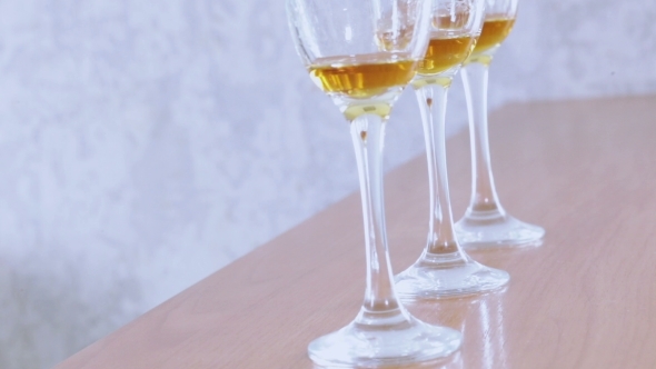 Taking Glasses Of Wine alt