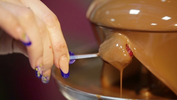 Strawberry In Chocolate Fountain