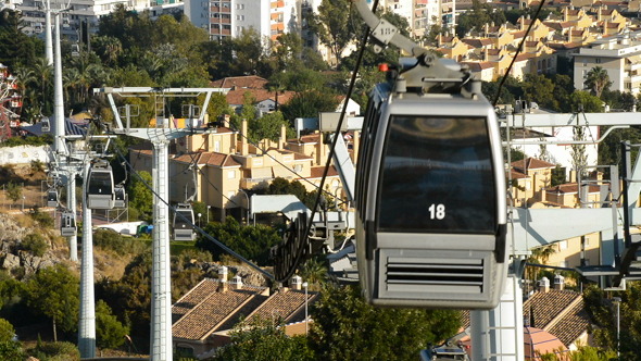 Cable Car Line Running with Town at Background