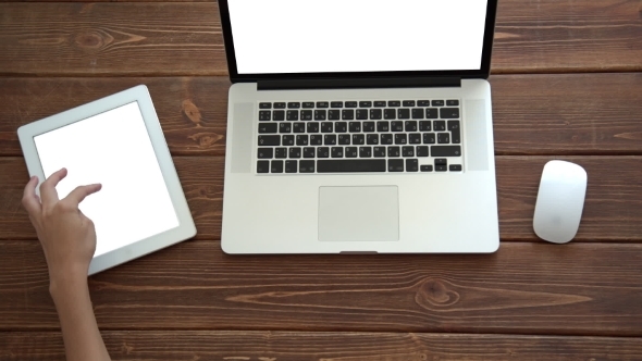 Woman Working On Laptop And Tablet Pc 