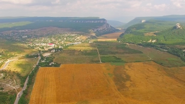 Fantastic Panorama Of Hilly Terrain And Harvest