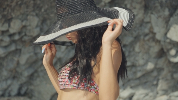 Charming Brunette With a Pierced Navel Wearing  alt