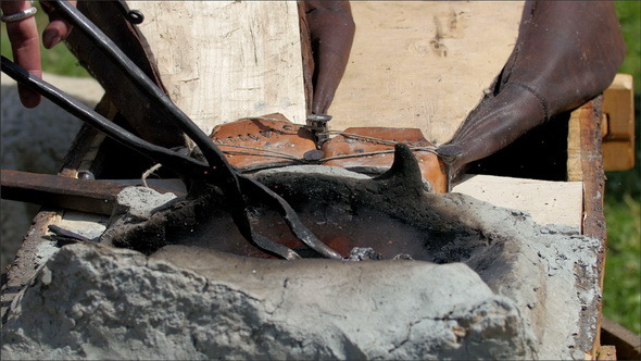 The Blowing of Air and Putting the Metal  alt