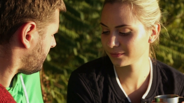 Couple Illuminated Setting Sun alt