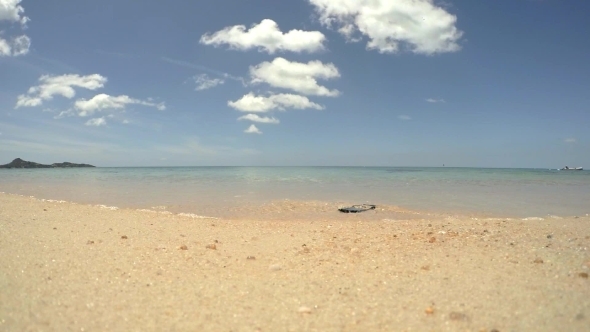 Throwing Mobile Phone In Sea On Beach. Freedom