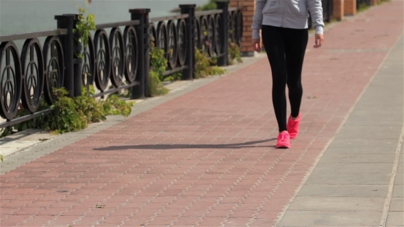 Young Girl Tying Her Laces alt