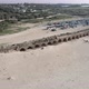 Ancient Aqueduct on the Beach in the City of Caesarea Israel Drone Shot - VideoHive Item for Sale