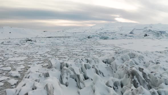 Aerial View of the J Kuls Rl n Glacial Lagoon and Floating Icebergs. The Beginning of Spring in