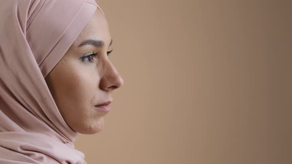 Close Up Profile Portrait Face of Arab Saudi Woman Muslim Lady in Stylish Headscarf Beautiful Asian
