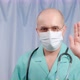 The Doctor Shows with a Gesture That It is Necessary to Stop Not to Continue - VideoHive Item for Sale
