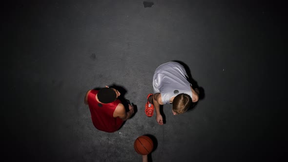 Top View of Throwin of the Ball Before the Start of the Game in Basketball Competition