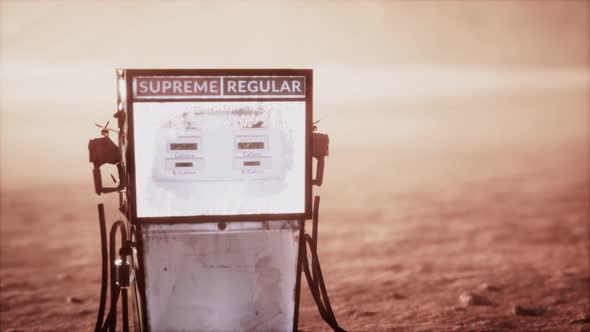 A Vintage Rusted Gas Pump Abandoned in the Desert alt