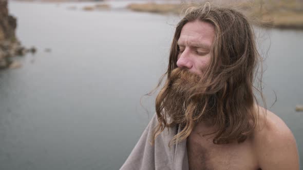 Bearded Man Meditates on Nature
