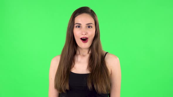 Wow Woman Emotion on a Green Screen in the Studio