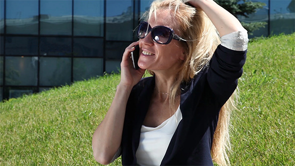 Young Woman Talking On Cellular Phone 