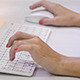Girl Typing on the Keyboard - VideoHive Item for Sale