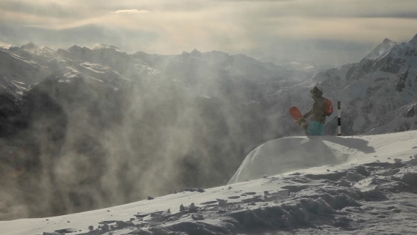 Snowboarder On The Top Of The Mountain
